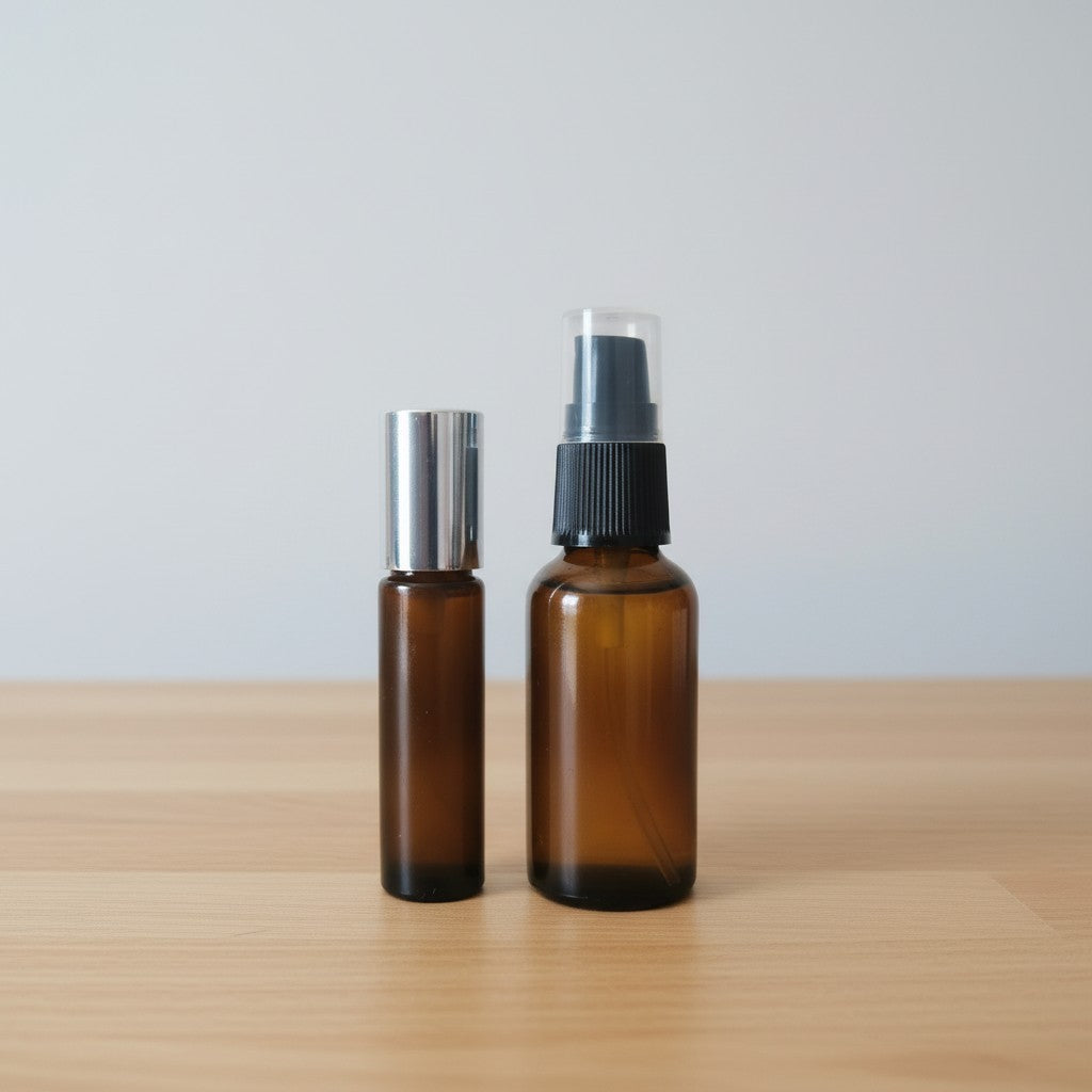 Amber glass 30 ml pump bottle and 10 ml roll-on bottle of Day & Night Face Serum